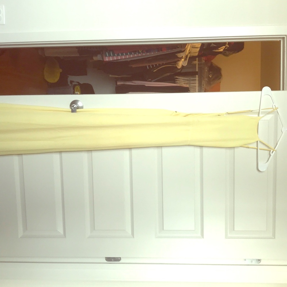 Long yellow slim dress.